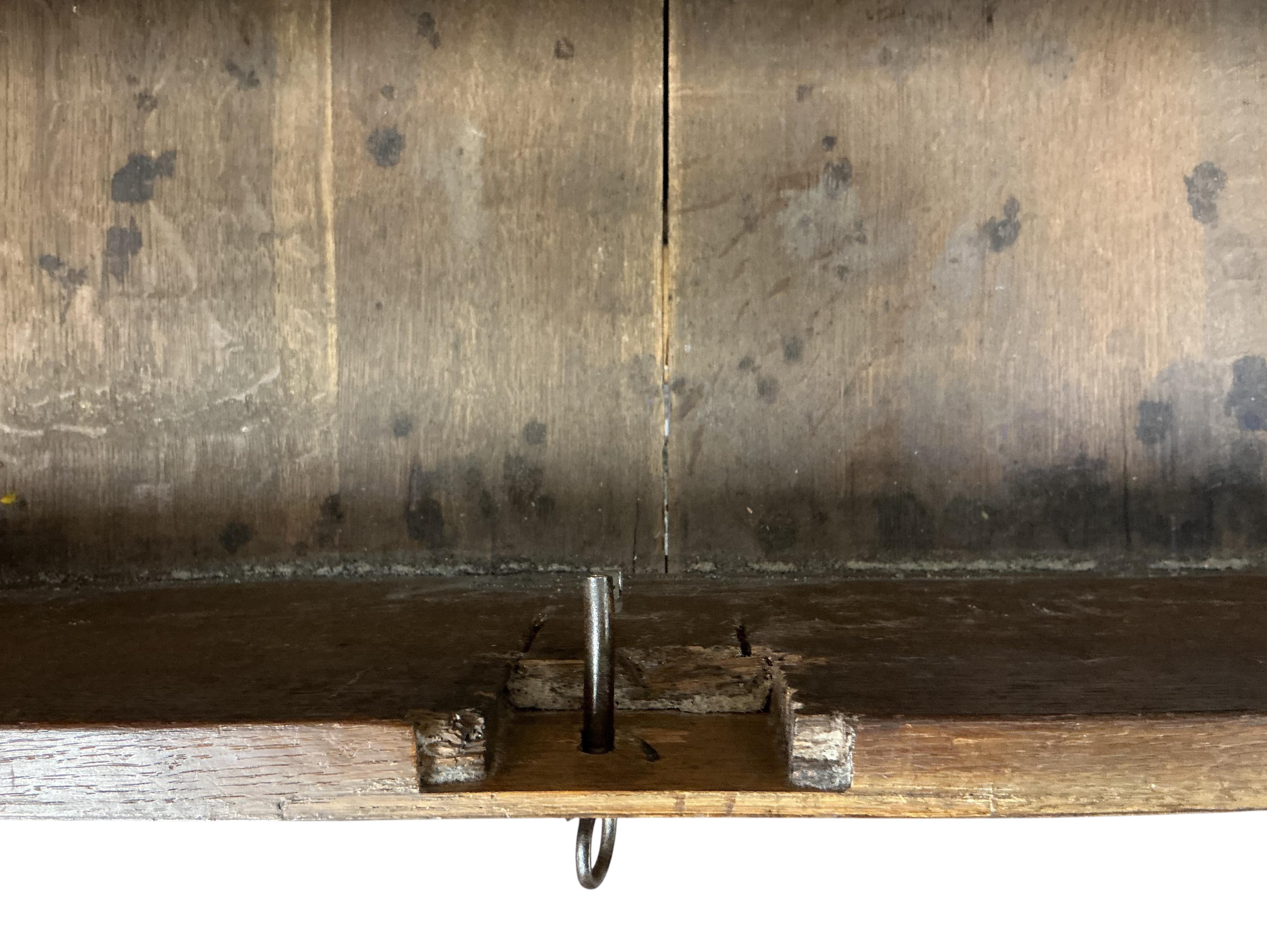 An early 18th century feather banded walnut chest, damaged, width 95cm, depth 54cm, height 91cm